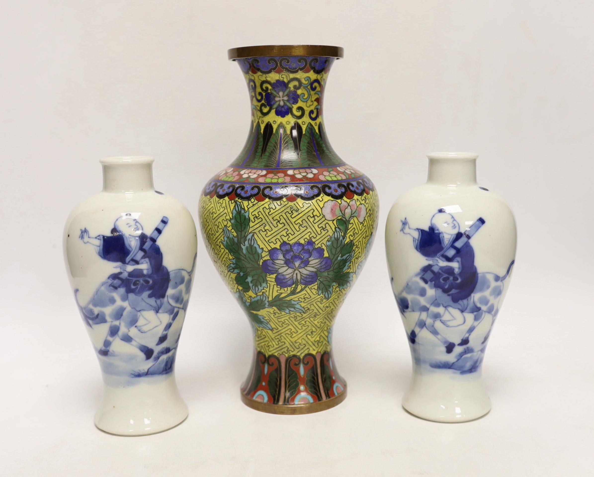 A pair of Chinese blue and white vases, c.1900 and a Chinese cloisonné enamel vase, largest 24cm high